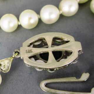 Ladys necklace with akoya pearls closure in white gold filled with tourmaline