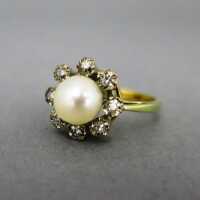 Gold ring with big pearl and diamonds
