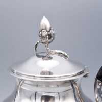 Vintage round teapot in silver with pretty decoration