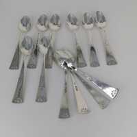 12 exceptional Art Deco mocha spoons in silver with pretty decoration