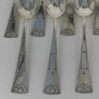 12 exceptional Art Deco mocha spoons in silver with pretty decoration