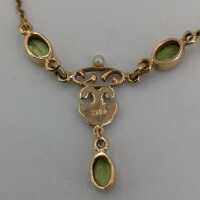 Beautiful delicate ladies necklace in rose gold with peridots