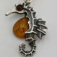 Charming vintage seahorse earrings in silver and amber