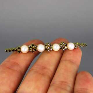 Antique gold brooch with garnets and pearls