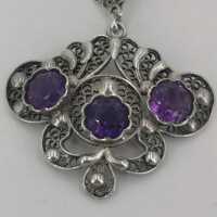 Vintage filigree pendant in silver with amethysts