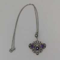 Vintage filigree pendant in silver with amethysts