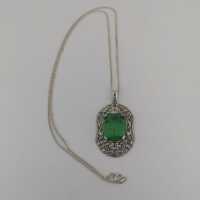 Art nouveau pendant in silver with emerald green glass stone