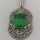 Art nouveau pendant in silver with emerald green glass stone