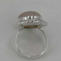 Vintage silver ladies ring with a rose quartz cabochon