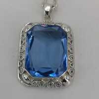 Art Deco silver pendant with a sky blue glass stone
