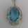 Art Deco pendant in silver with sky blue glass stone