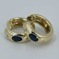 Elegant hinged hoop earrings in gold with sapphires and diamonds