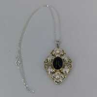 Signed Art Nouveau pendant in silver with gemstones