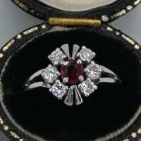Vintage engagement ring in white gold with a ruby and diamonds