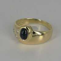 Vintage band ring in gold with a sapphire and diamonds
