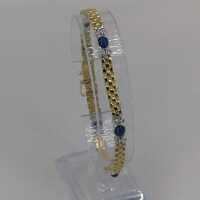 Vintage bracelet in yellow and white gold with sapphires and diamonds