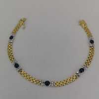 Vintage bracelet in yellow and white gold with sapphires and diamonds