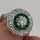 Art Deco platinum ring with diamonds and emeralds