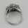 Art Deco platinum ring with diamonds and emeralds