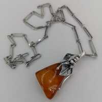Unique vintage pendant in silver and amber from the 1970s