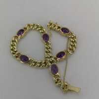 Elegant vintage ladies bracelet made from a curb chain with amethysts