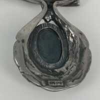 Unusual designer necklace made from silver and haematite
