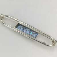 Elegant Art Deco ladies brooch in 835 silver and blue topazes