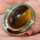 Vintage ladies ring in yellow gold with a fascinating tigers eye cabochon