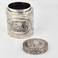 Antique silver tea caddy with relief decoration in baroque style