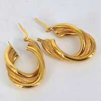 Enchanting hoop earrings in 585 yellow gold with an unusual design