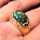 Vintage ring in 375 yellow gold with an oval moss agate