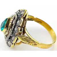 Art Nouveau ladies ring in gold and silver with an emerald and diamonds