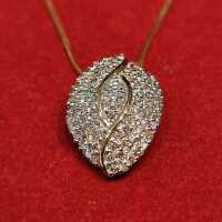 Exquisite vintage necklace in 585 gold and a pendant with diamonds