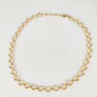 Modernist necklace with circular gold wire elements in 333 gold