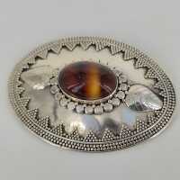 Art Nouveau brooch in 925 silver with a fascinating tigers eye cabochon