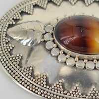 Art Nouveau brooch in 925 silver with a fascinating tigers eye cabochon