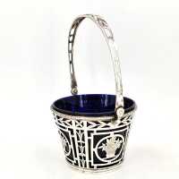 Elegant Art Nouveau basket with handle in 800 silver with blue glass insert