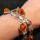 Vintage Schmuck in Silber - Annodazumal Antikschmuck: Armband aus 835er Silber mit Fischmotiven und Bernsteinperlen von Fischland, Mid Century Design, Deutschland um 1950