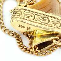 Antique pendant with tiger claw in 333 gold around 1900