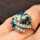 Vintage Schmuck in Gold - Annodazumal Antikschmuck: Opulenter Vintage-Ring mit Saphiren und Brillanten in floraler Fassung aus Weißgold, glamouröser Schmuck von 1974
