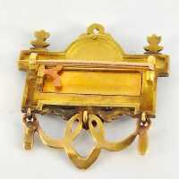 Antike Brosche „Puttenreigen“ aus 750er Gold mit Email & Diamanten