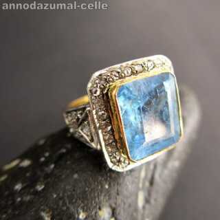 Gold ring with diamonds and huge aquamarine