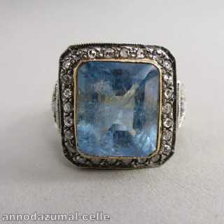 Gold ring with diamonds and huge aquamarine