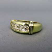 Beautiful ladys gold band ring with sparkly diamonds