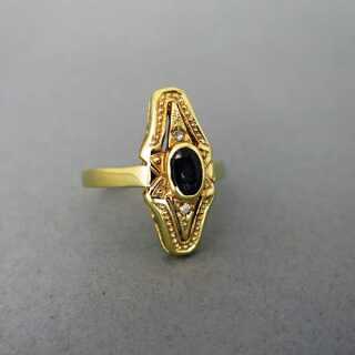 Gold ring with sapphire and diamonds