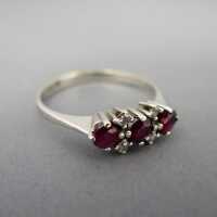 White gold ring with rubies and diamonds