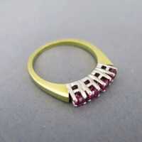Elegant 14 k gold ring with four rubies