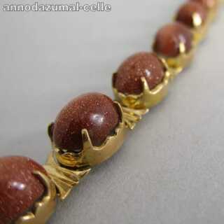 Wonderful vintage 18 k gold bracelet with sun stone cabochons