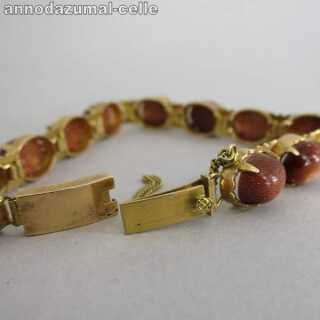Wonderful vintage 18 k gold bracelet with sun stone cabochons