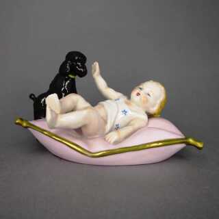 Porzellanfigur Baby mit Hund Sitzendorf Thüringen